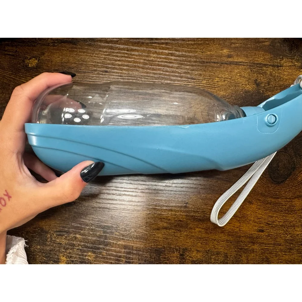 Plastic Pet Traveling Water Bottle with Wrist Strap, used once